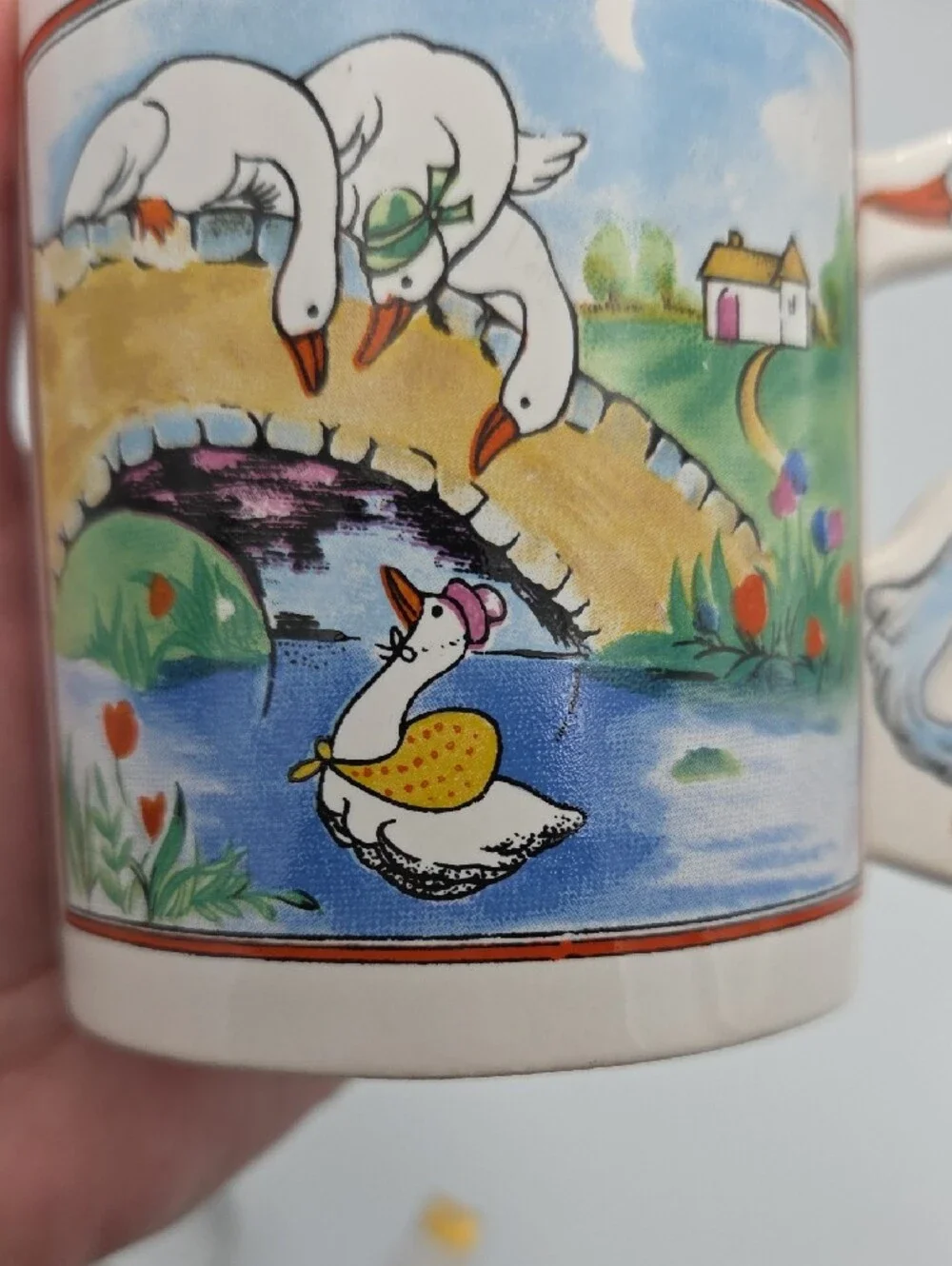 White Ceramic Goose Handle Mug with Colorful Farm Scene